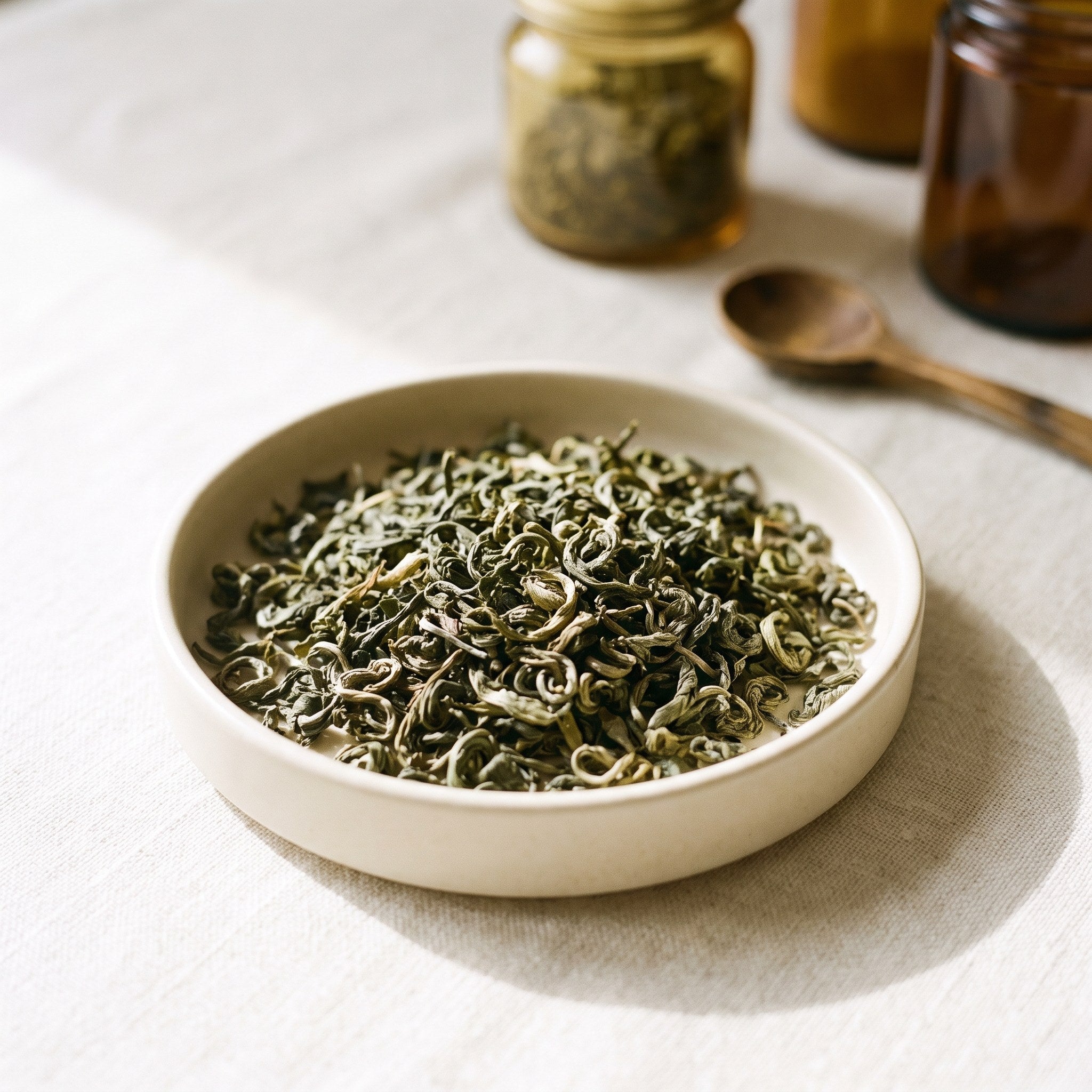 Loose green tea leaves