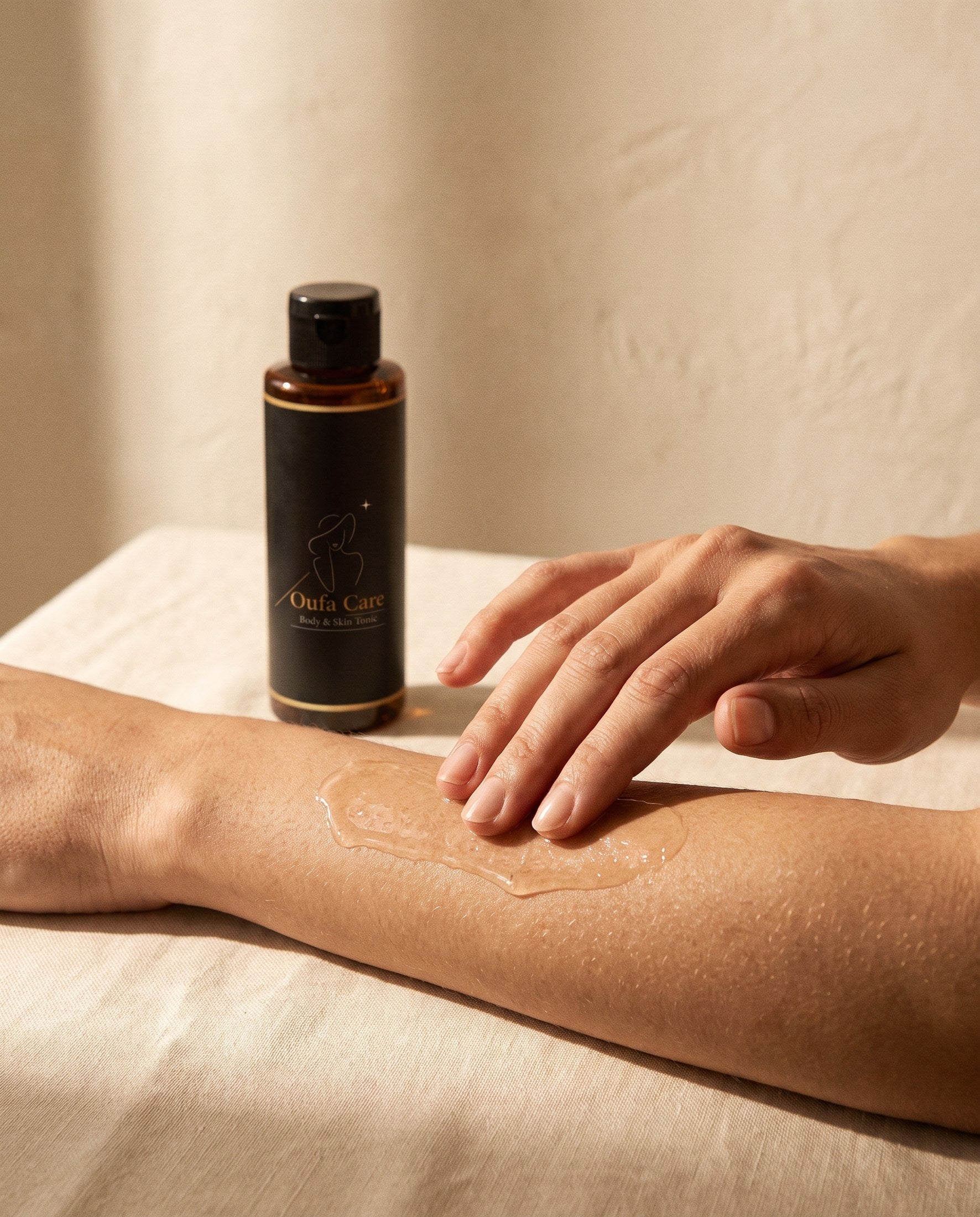Smoothing the tonic onto skin